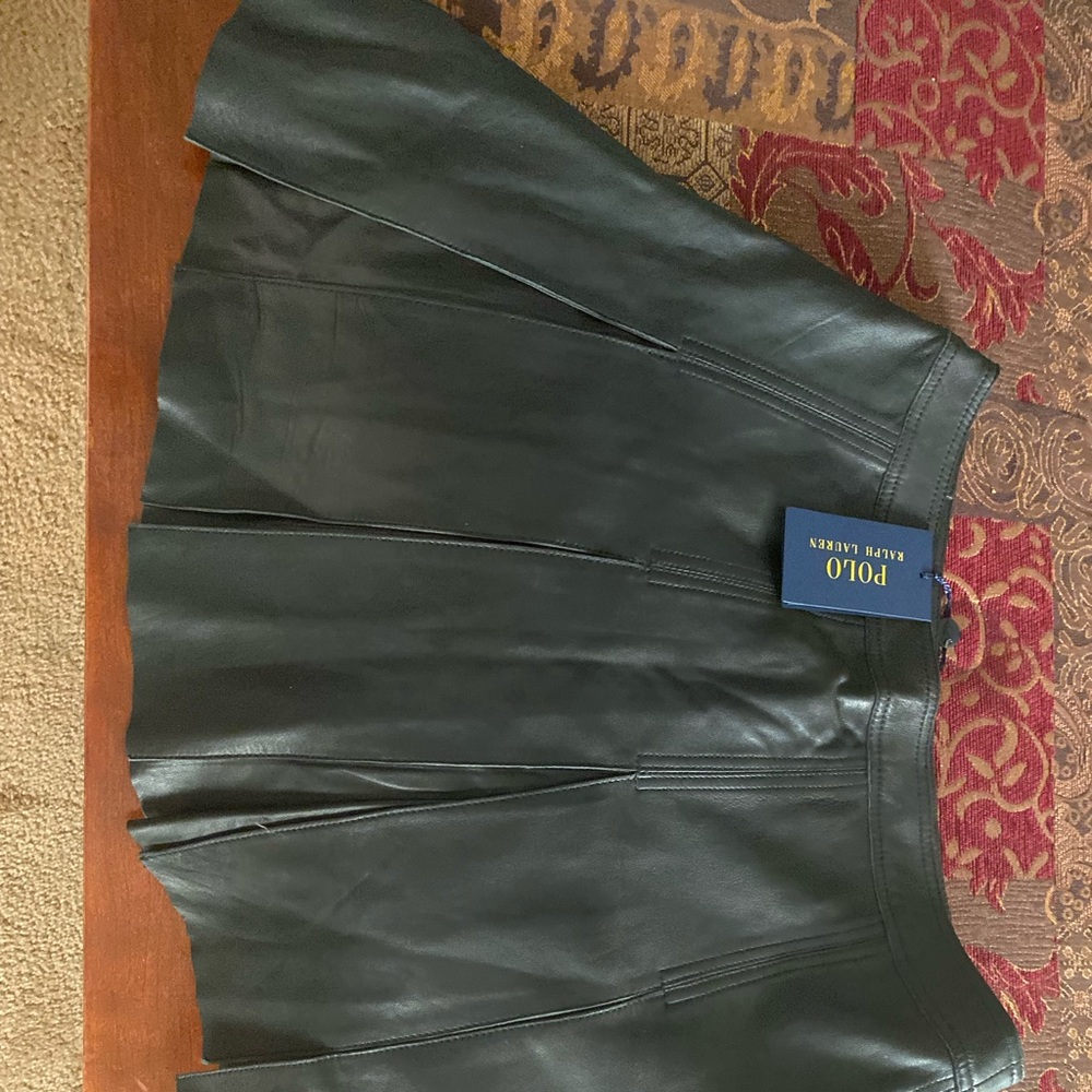 Black leather pleated mini skirt